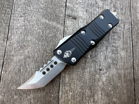 Microtech 819-10S Signature Series Troodon Mini OTF AUTO 1.99" Stonewashed Hellhound Tanto Blade, Black Aluminum Handles